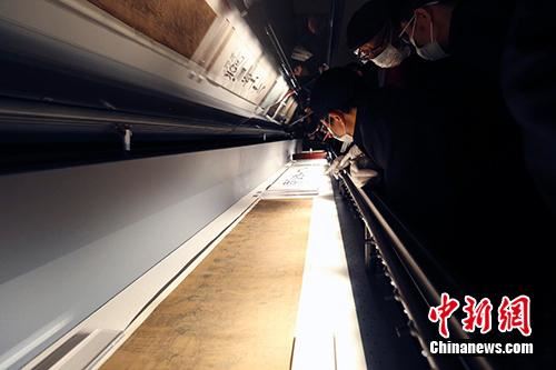 《八十七神仙卷》布展现场。央美供图 点击进入下一页