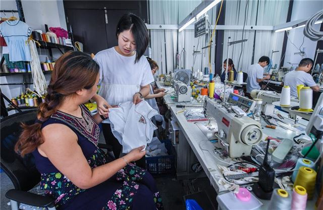 (经济)(7)“童装之都”企业积极开拓国内市场